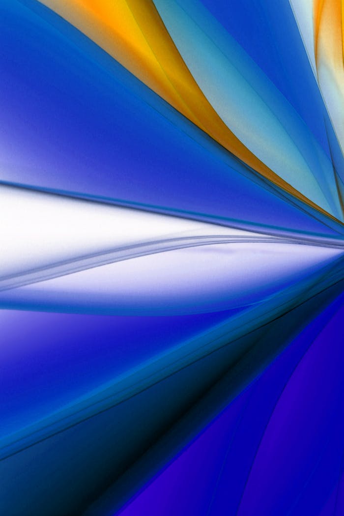 Dynamic abstract image with vibrant blue and orange wave patterns.
